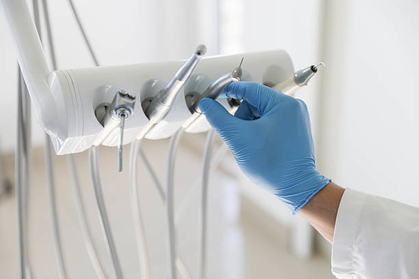 Professional Tooth Extraction technician working in Westwood, KS